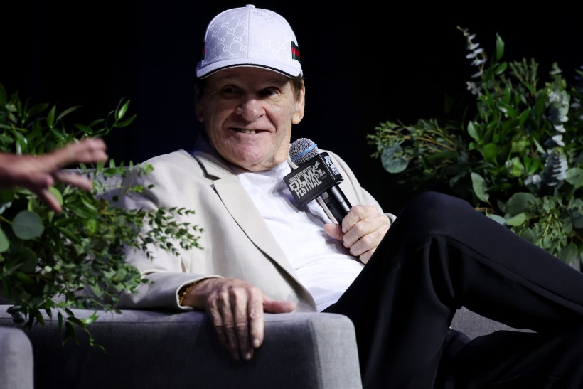 Pete Rose speaks onstage during the 