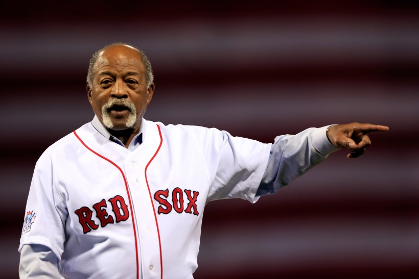 Former Boston Red Sox player Luis Tiant waves to the crowd before Game One of the 2013 World Series between the Boston Red Sox and the St. Louis Cardinals at Fenway Park on October 23, 2013 in Boston, Massachusetts. 