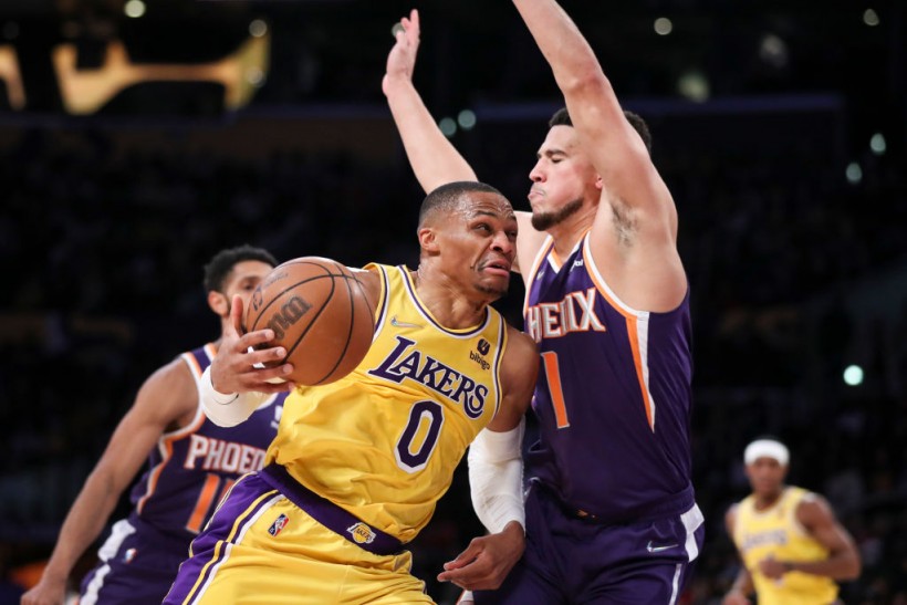 Devin Booker Leads Phoenix Suns to Win Over Los Angeles Lakers; James Injures Ankle in Loss