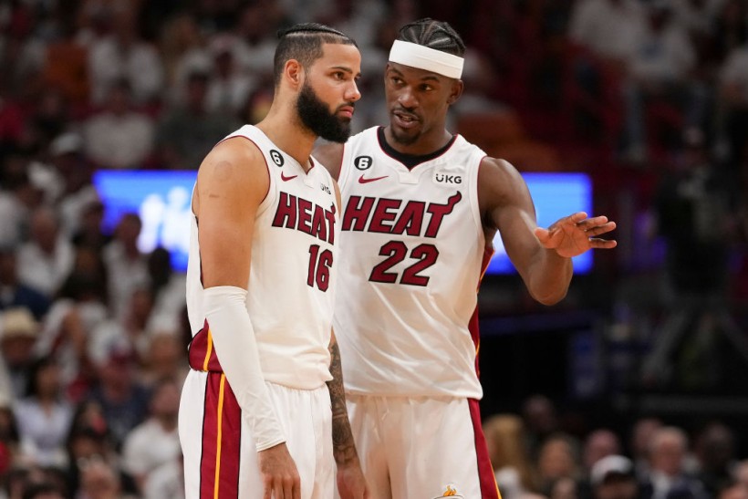 Caleb Martin and Jimmy Butler - New York Knicks v Miami Heat - Game Three