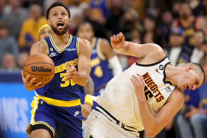 Stephen Curry and Nikola Jokic - Denver Nuggets v Golden State Warriors