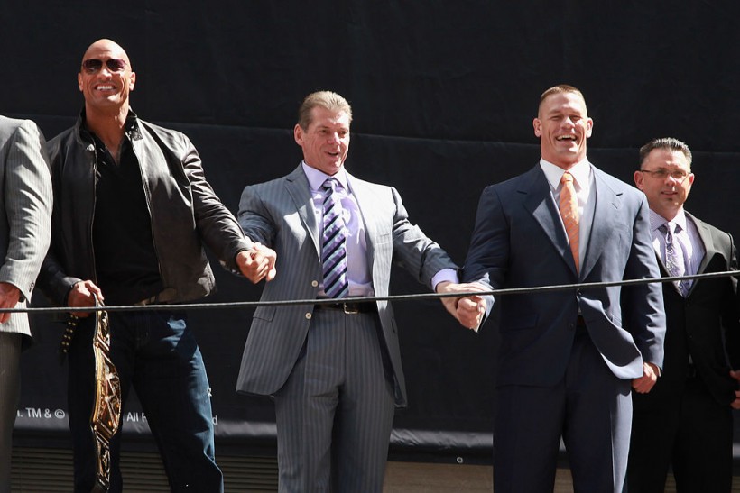 Dwayne Johnson, Vince McMahon and John Centa