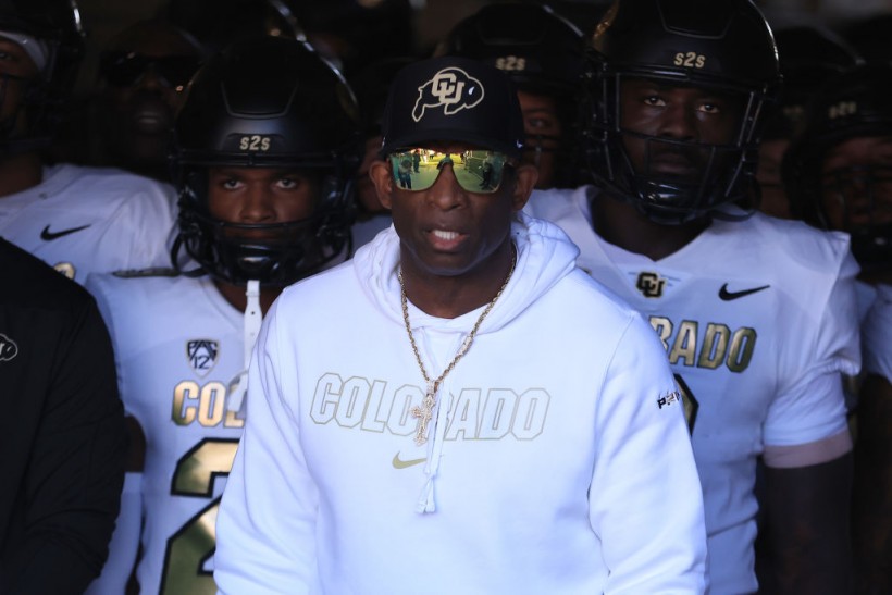 Colorado Buffaloes coach Deion Sanders and his players