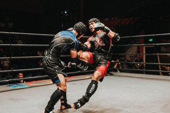 Two Fighter Fighting Inside Ring